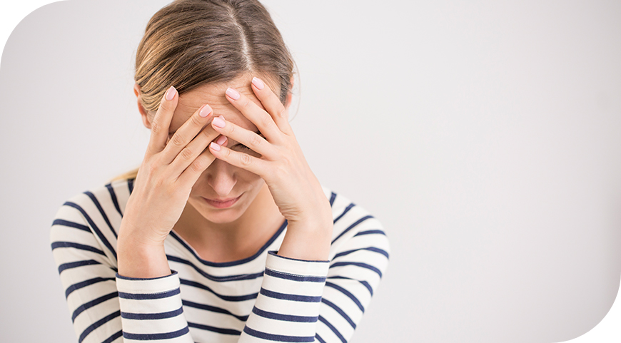 Depressed young woman sitting