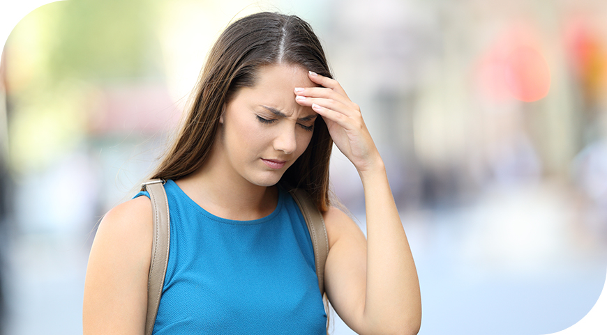 Young girl having headache