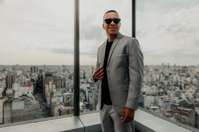 ED treatment options: confident man in a suit viewing the city