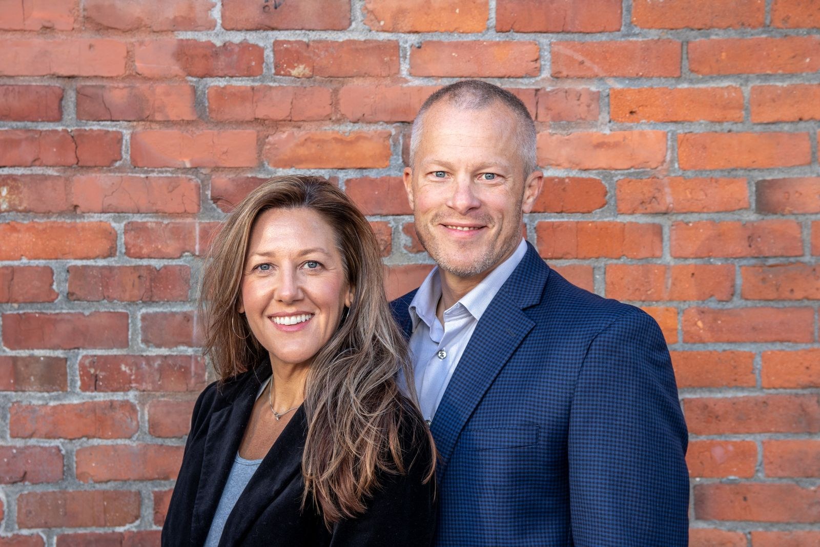 Functional medicine in Barrington: healthy couple in their 40s smiling together outdoors