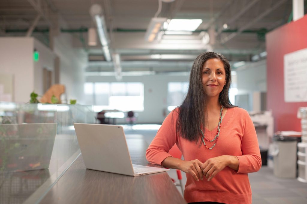Hormone therapy doctor: woman working at a modern office desk