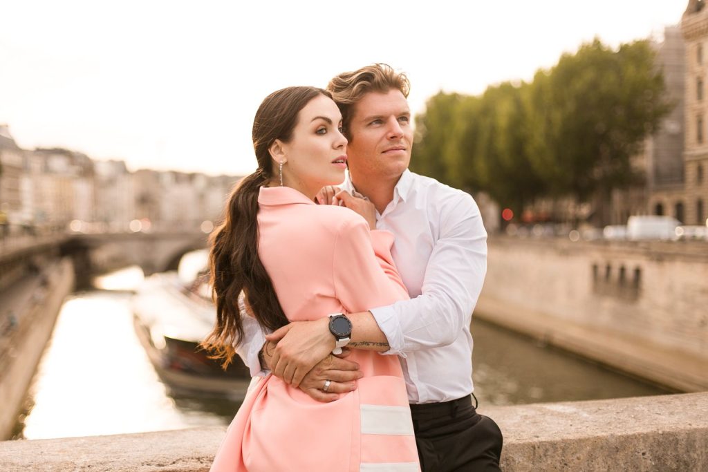 HRT St. Charles: happy couple embracing on a riverside walk