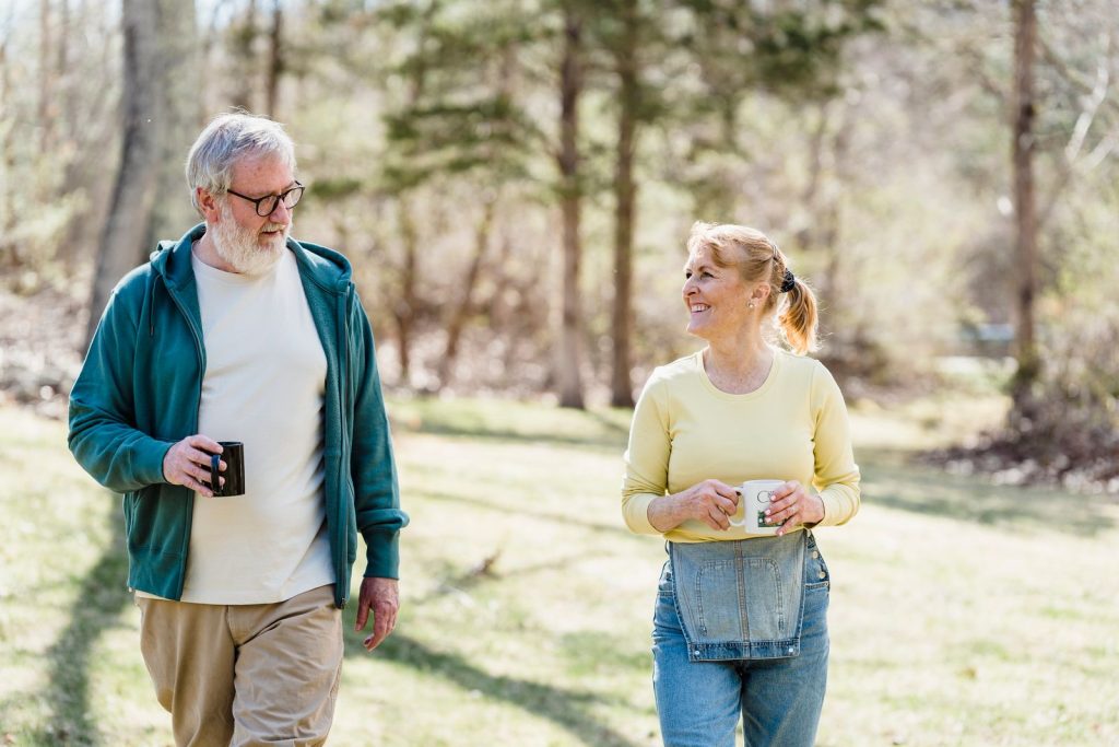 IV ketamine therapy Schaumburg: couple in their 50s on a calm walk in a park