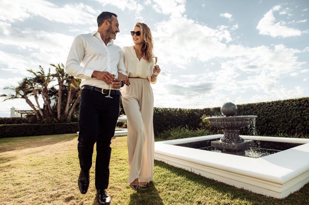 P Shot benefits: confident couple walking on an estate lawn