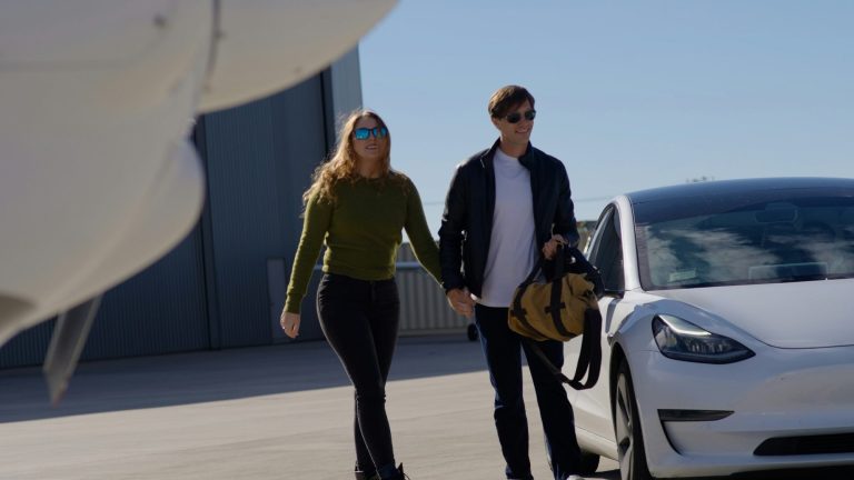 P Shot Chicago: couple walking together from a private plane