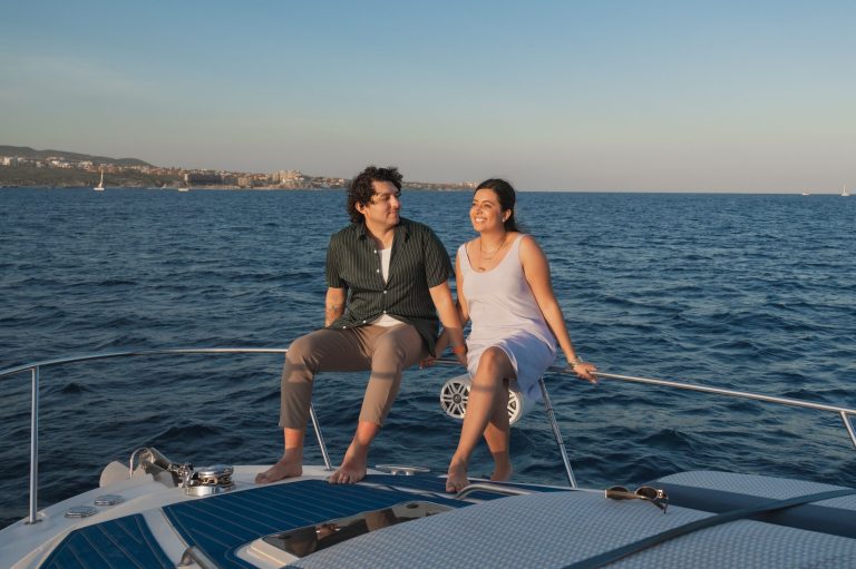P-Shot vs shockwave therapy for ED: smiling couple relaxing on a yacht