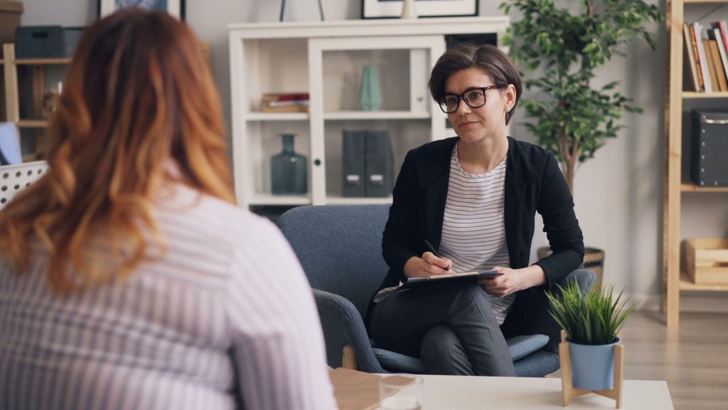 Perimenopause treatment: clinician discussing care with a patient