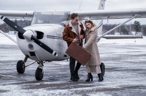 Regenerative ED treatment: couple beside a private aircraft