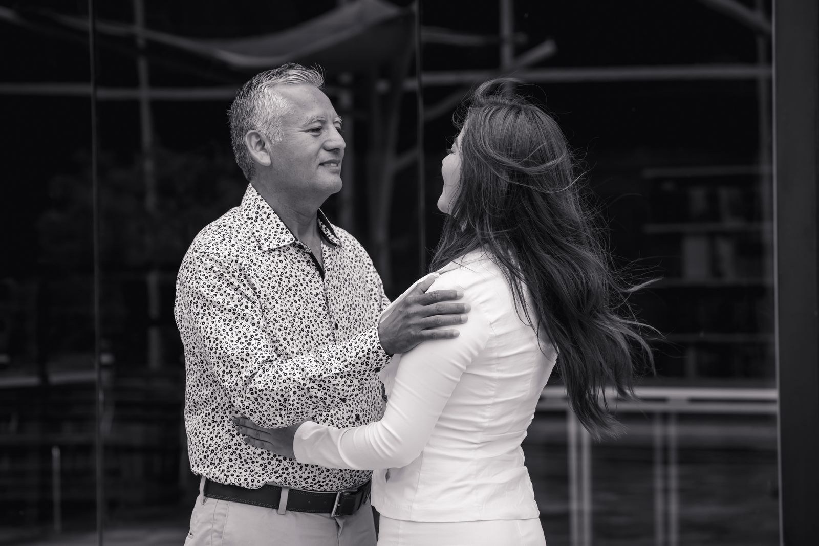 Trimix or quad mix injections: grey-haired man dancing with his partner in a black-and-white photo